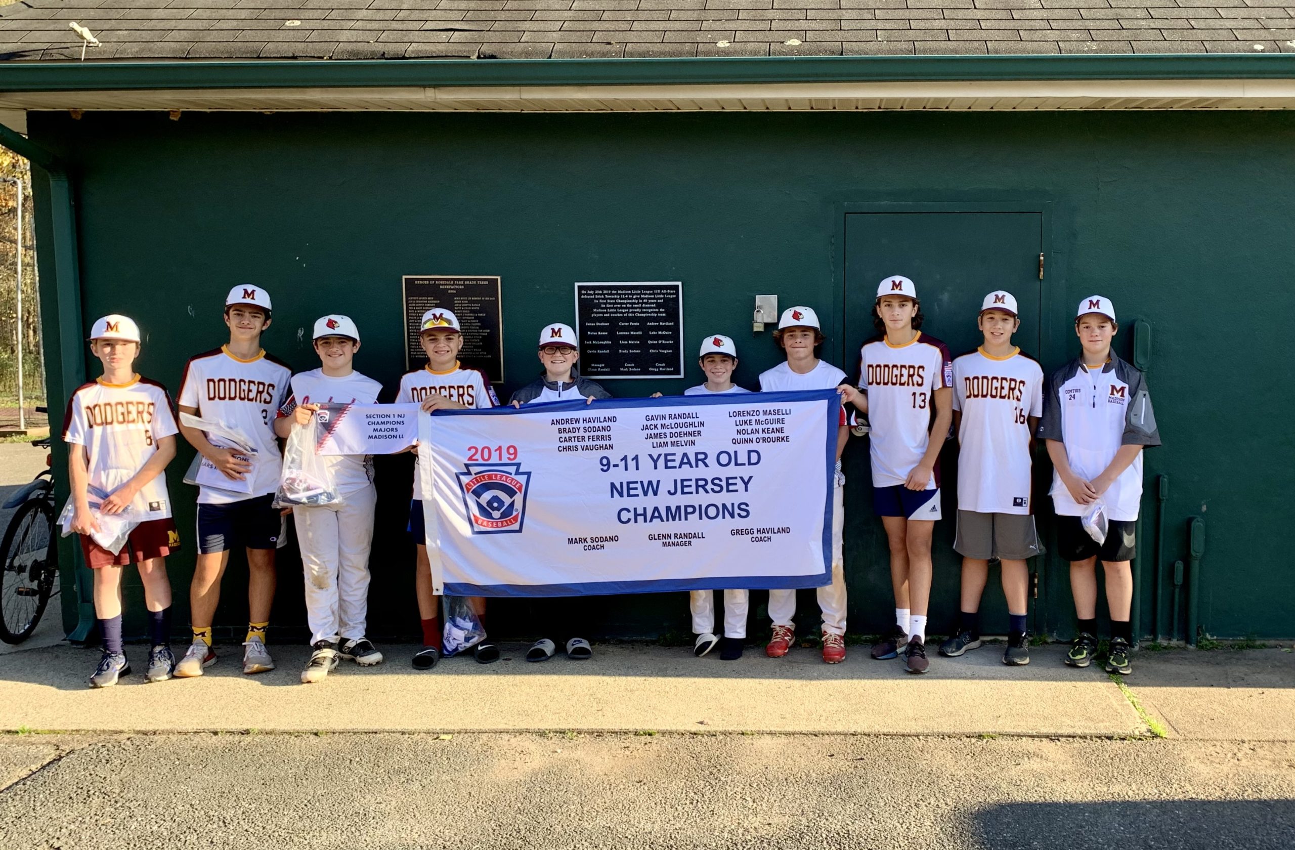 The All-Star team is honored with a plaque and banner commemorating their 2019 state title.